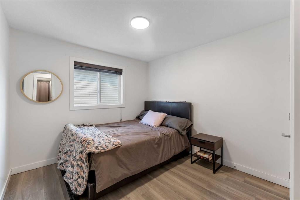 156 Rainbow Falls Heath, Chestermere, AB - Indoor Photo Showing Bedroom