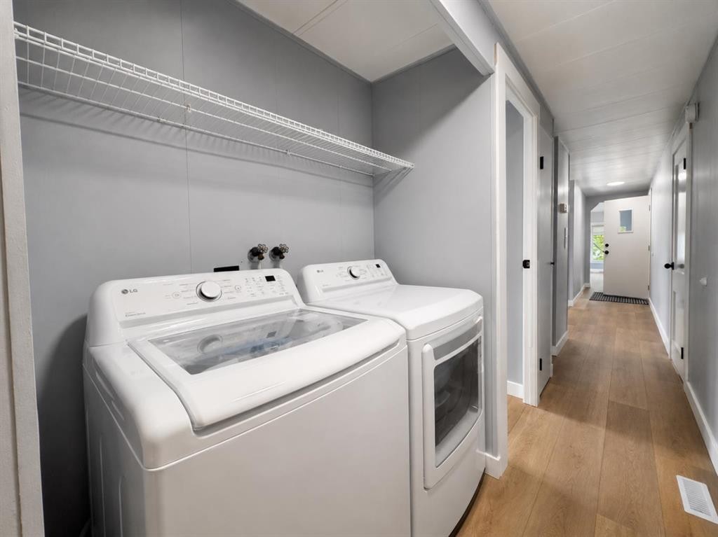 168 Huntwell Road Ne, Calgary, AB - Indoor Photo Showing Laundry Room