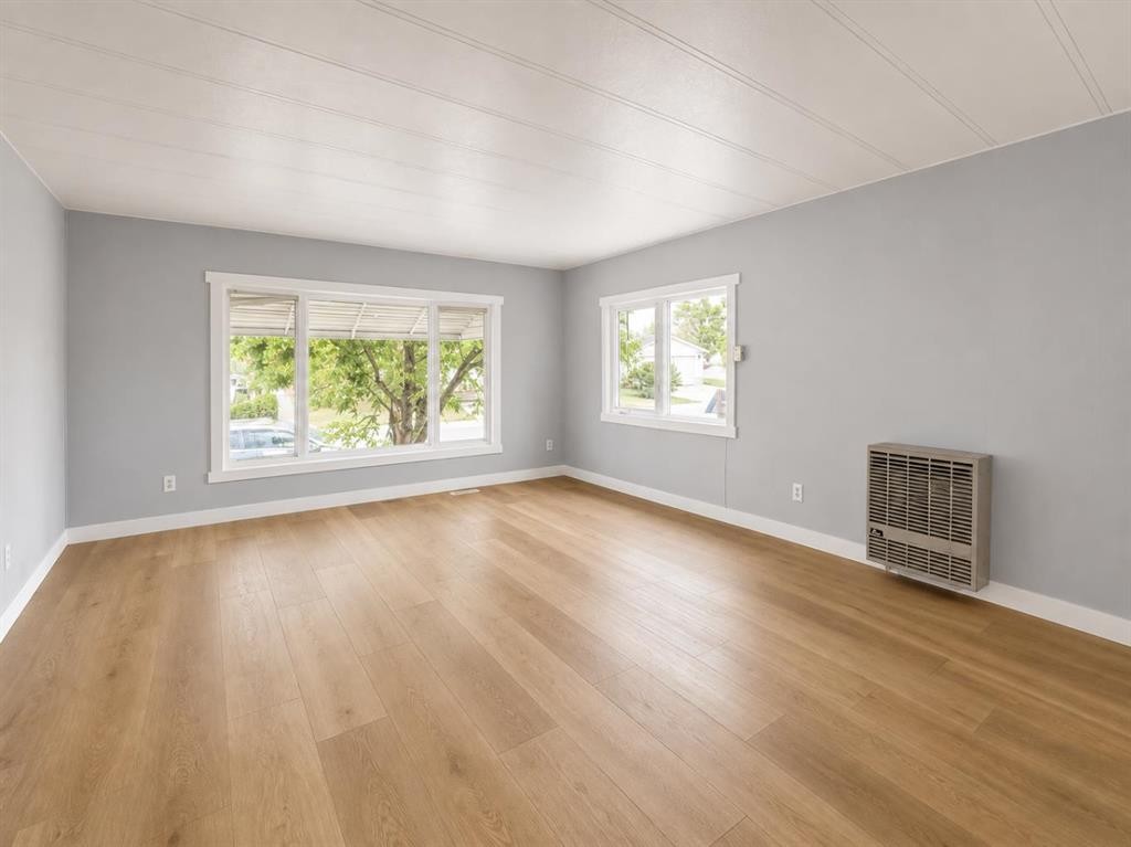 168 Huntwell Road Ne, Calgary, AB - Indoor Photo Showing Living Room