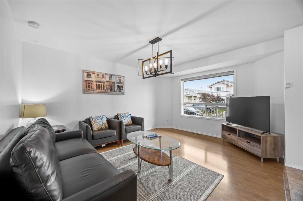 133 Applemead Close Se, Calgary, AB - Indoor Photo Showing Living Room