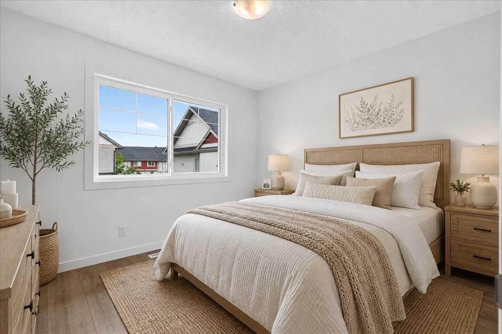134 New Brighton Landing Se, Calgary, AB - Indoor Photo Showing Bedroom
