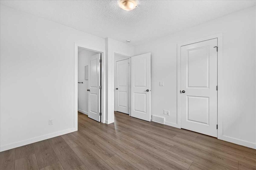 134 New Brighton Landing Se, Calgary, AB - Indoor Photo Showing Other Room