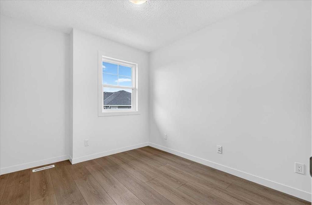 134 New Brighton Landing Se, Calgary, AB - Indoor Photo Showing Other Room