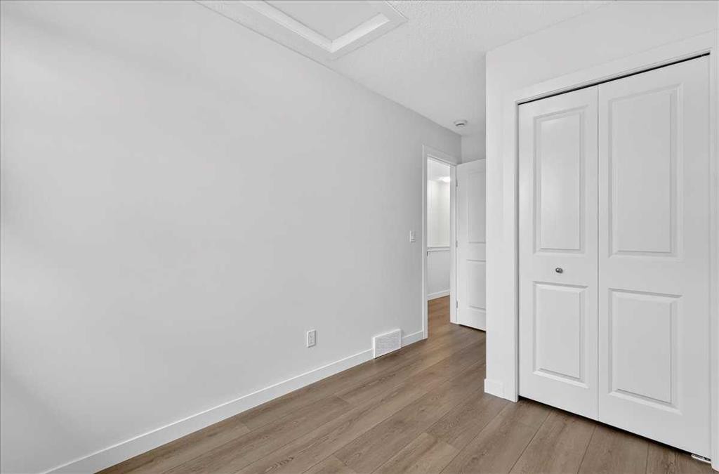 134 New Brighton Landing Se, Calgary, AB - Indoor Photo Showing Other Room