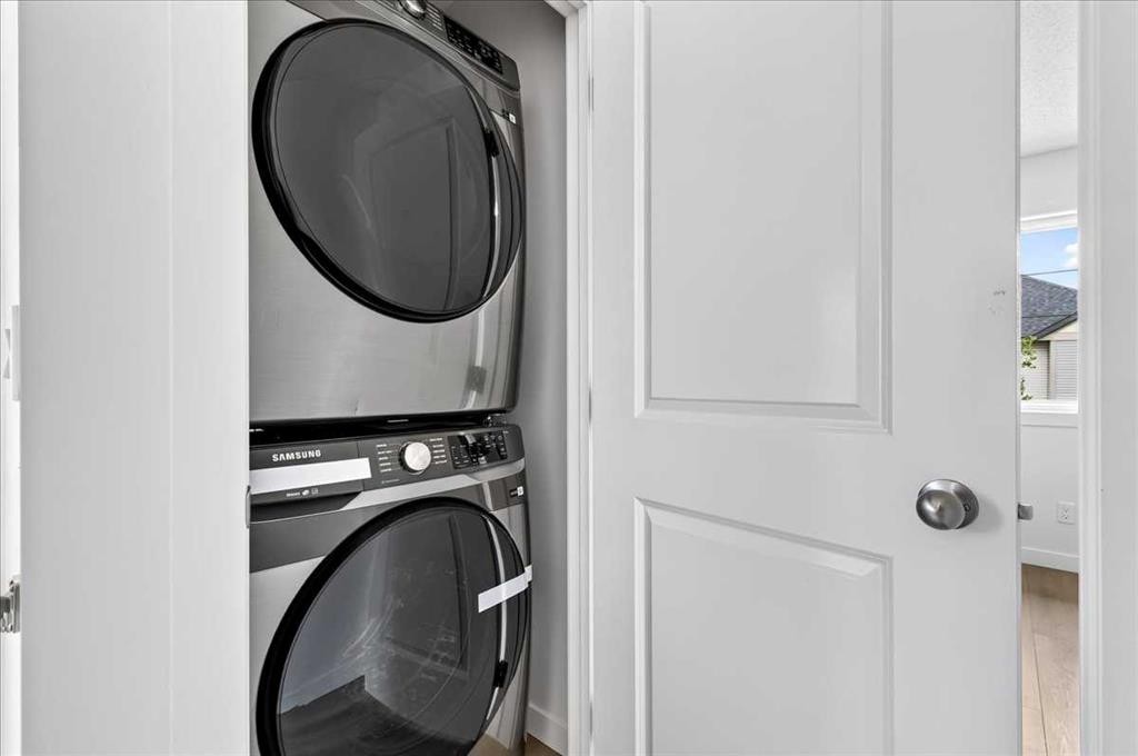 134 New Brighton Landing Se, Calgary, AB - Indoor Photo Showing Laundry Room