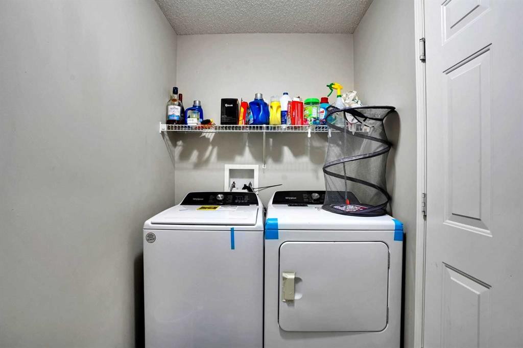 62 Covewood Manor, Calgary, AB - Indoor Photo Showing Laundry Room
