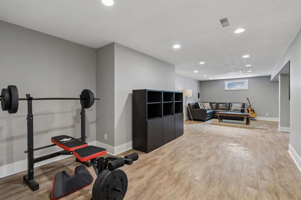 91 Winslow Crescent Sw, Calgary, AB - Indoor Photo Showing Gym Room