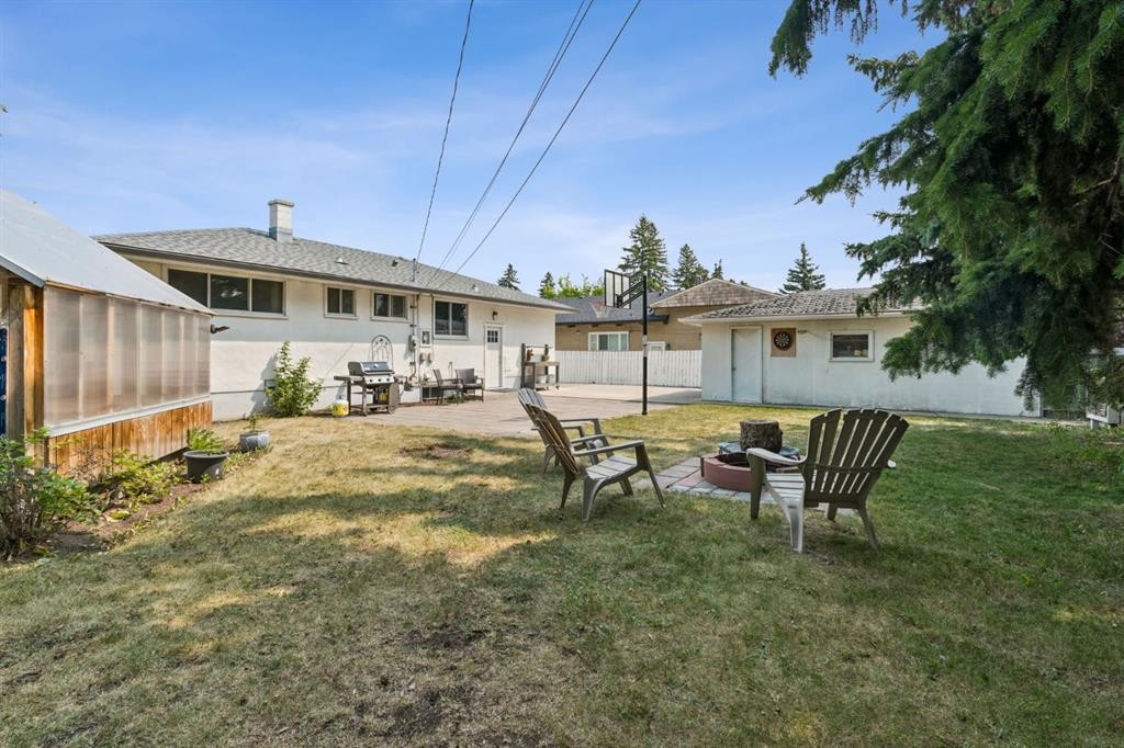 91 Winslow Crescent Sw, Calgary, AB - Outdoor With Deck Patio Veranda