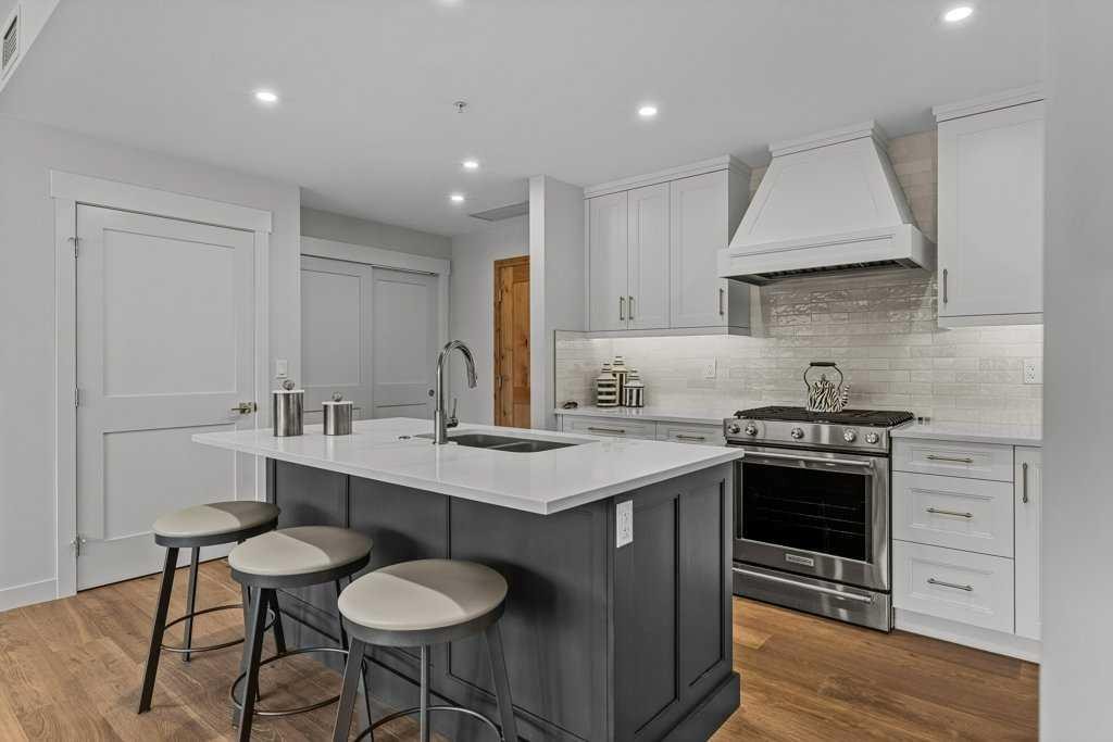 311-1315 Spring Creek Gate, Canmore, AB - Indoor Photo Showing Kitchen With Double Sink With Upgraded Kitchen