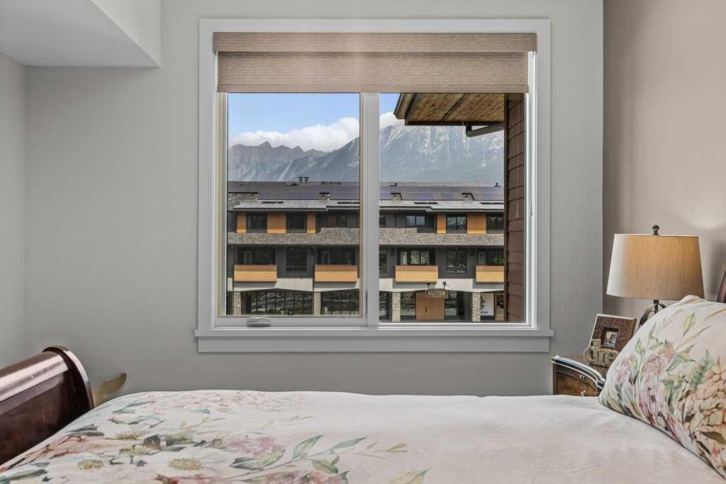 311-1315 Spring Creek Gate, Canmore, AB - Indoor Photo Showing Bedroom