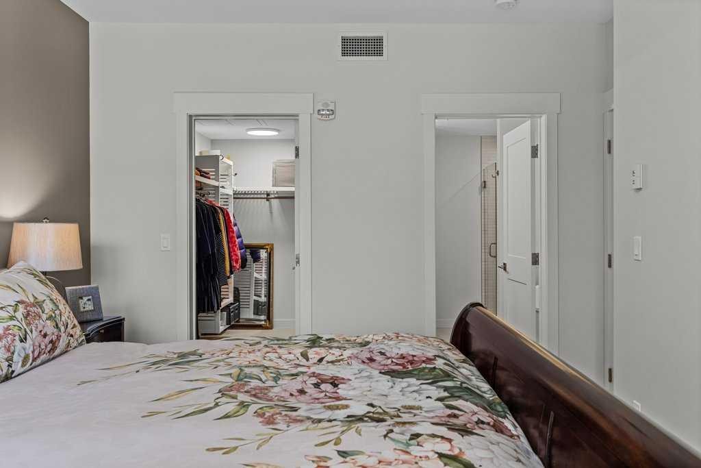 311-1315 Spring Creek Gate, Canmore, AB - Indoor Photo Showing Bedroom