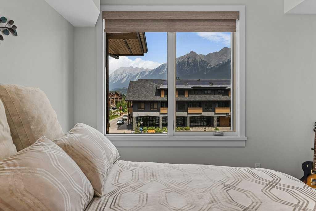 311-1315 Spring Creek Gate, Canmore, AB - Indoor Photo Showing Bedroom