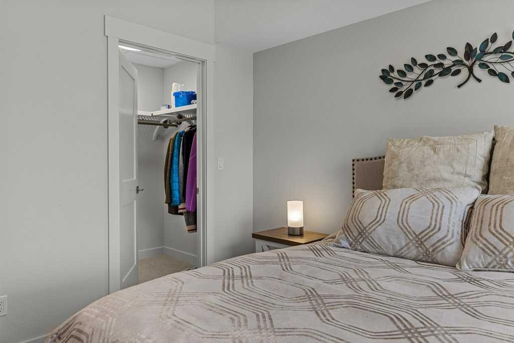 311-1315 Spring Creek Gate, Canmore, AB - Indoor Photo Showing Bedroom