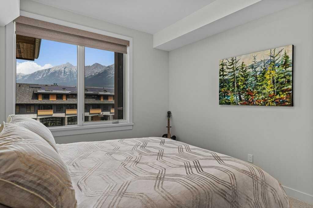 311-1315 Spring Creek Gate, Canmore, AB - Indoor Photo Showing Bedroom