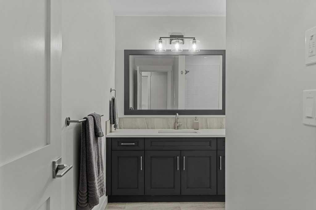 311-1315 Spring Creek Gate, Canmore, AB - Indoor Photo Showing Bathroom