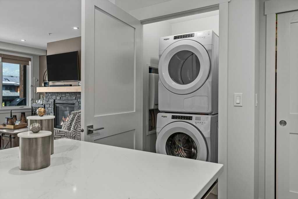 311-1315 Spring Creek Gate, Canmore, AB - Indoor Photo Showing Laundry Room