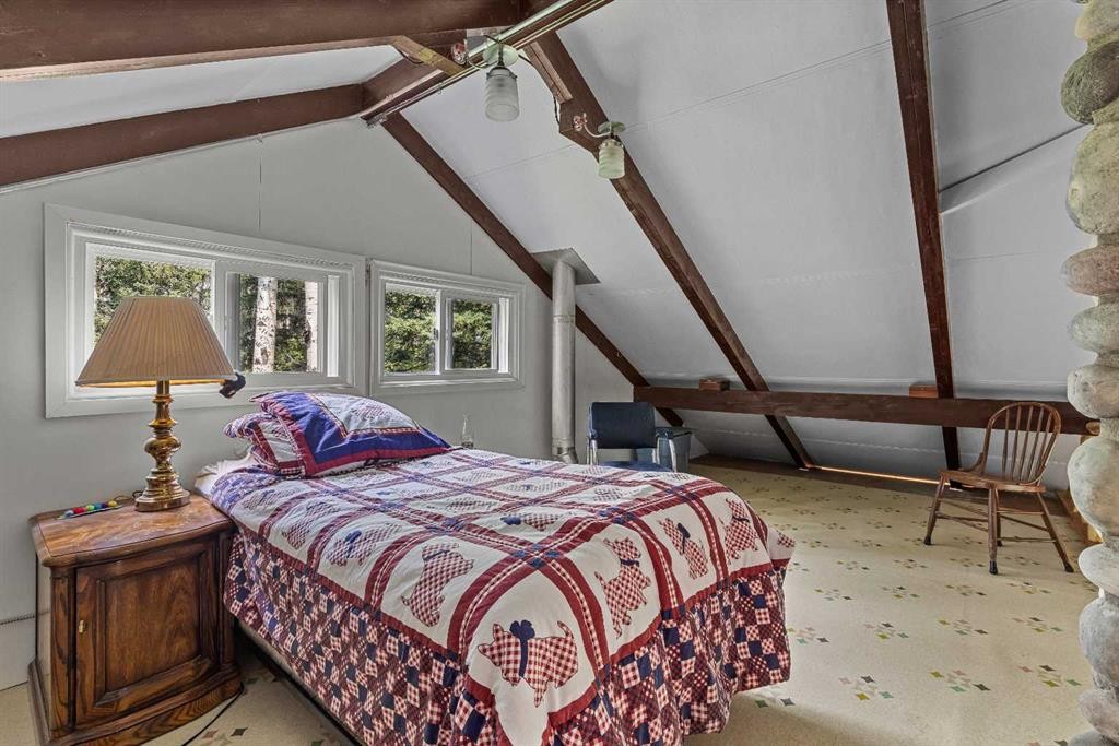 9 Des Arcs Road, Lac Des Arcs, AB - Indoor Photo Showing Bedroom