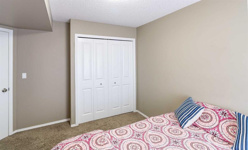1108-5 Saddlestone Way Ne, Calgary, AB - Indoor Photo Showing Bedroom
