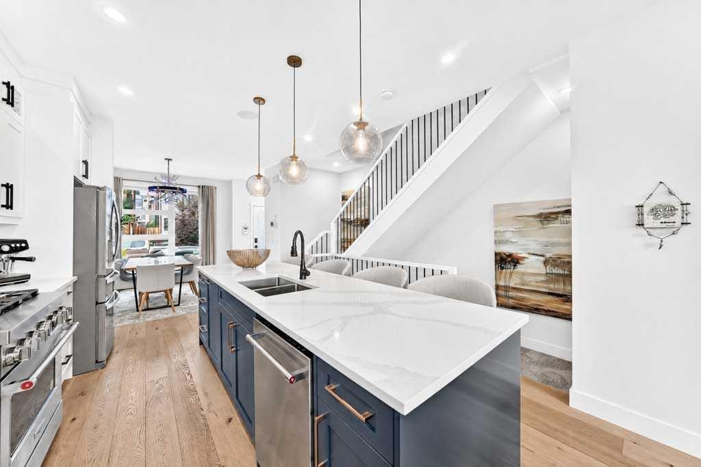 1703 31 Avenue Sw, Calgary, AB - Indoor Photo Showing Kitchen With Stainless Steel Kitchen With Double Sink With Upgraded Kitchen