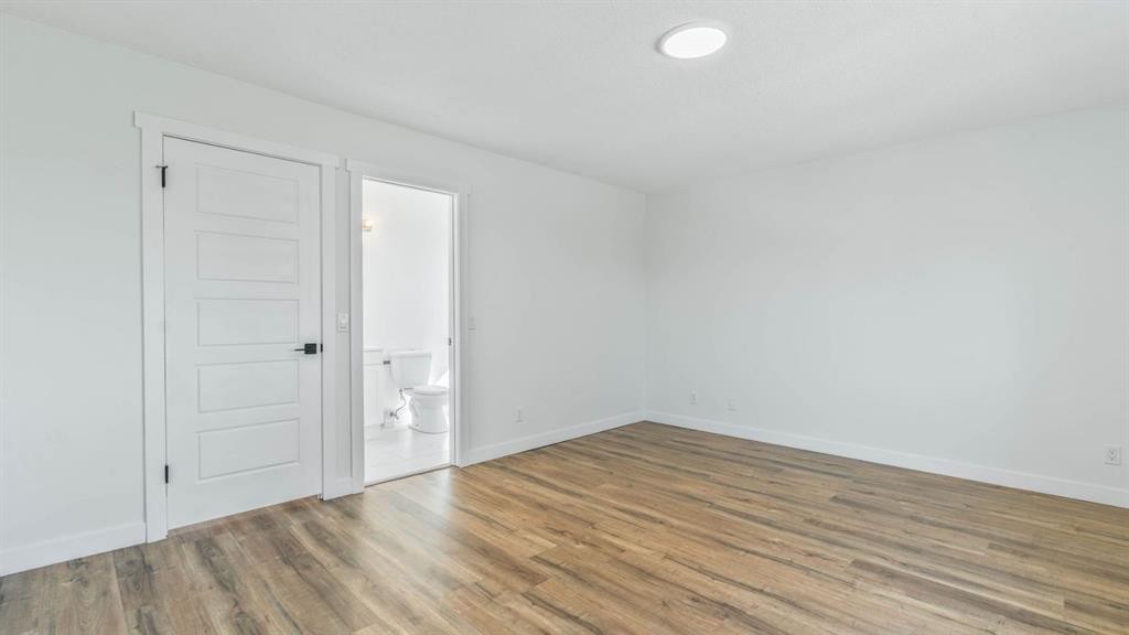 15 Taraglen Court Ne, Calgary, AB - Indoor Photo Showing Other Room