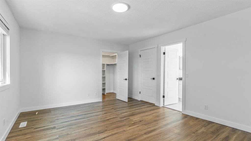 15 Taraglen Court Ne, Calgary, AB - Indoor Photo Showing Other Room