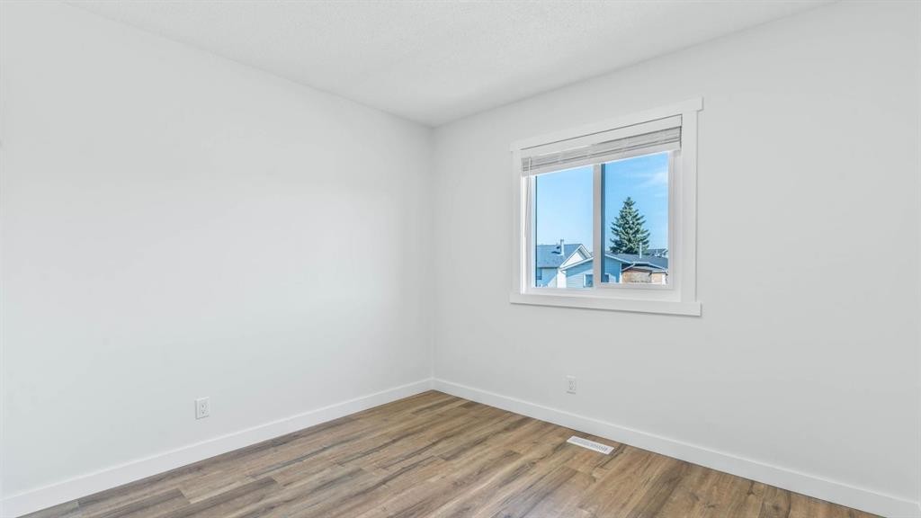15 Taraglen Court Ne, Calgary, AB - Indoor Photo Showing Other Room