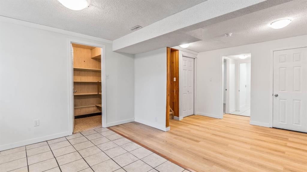15 Taraglen Court Ne, Calgary, AB - Indoor Photo Showing Other Room