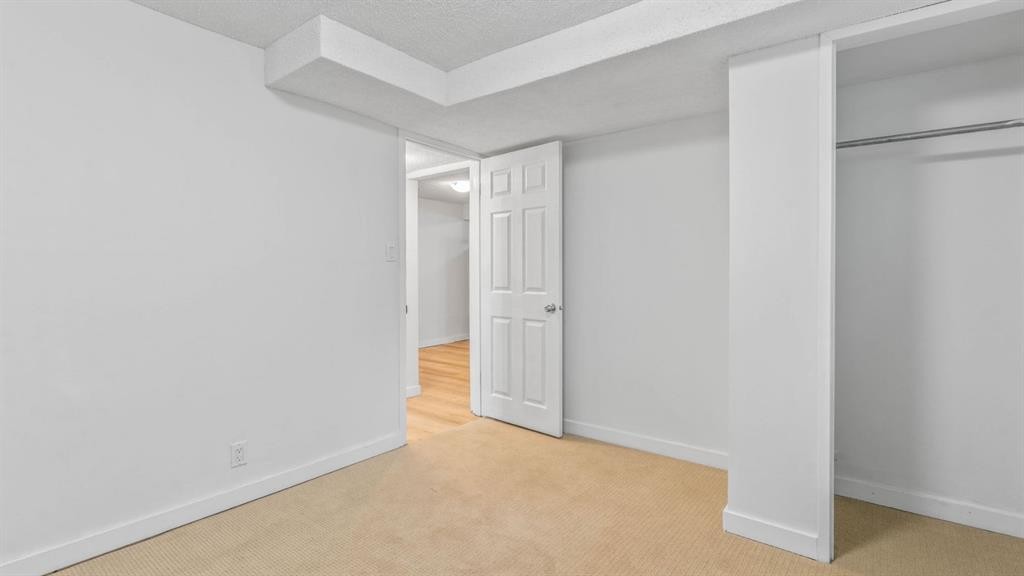 15 Taraglen Court Ne, Calgary, AB - Indoor Photo Showing Other Room