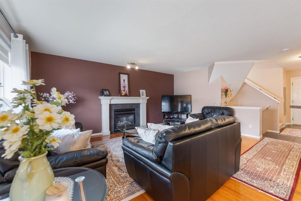 20 Saddlecrest Terrace Ne, Calgary, AB - Indoor Photo Showing Living Room With Fireplace