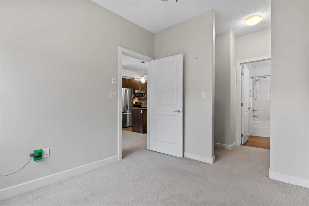 320-11 Millrise Drive Sw, Calgary, AB - Indoor Photo Showing Other Room