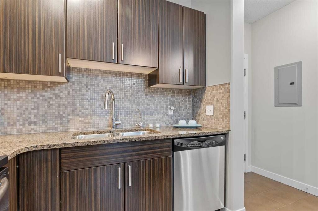 320-11 Millrise Drive Sw, Calgary, AB - Indoor Photo Showing Kitchen With Double Sink With Upgraded Kitchen