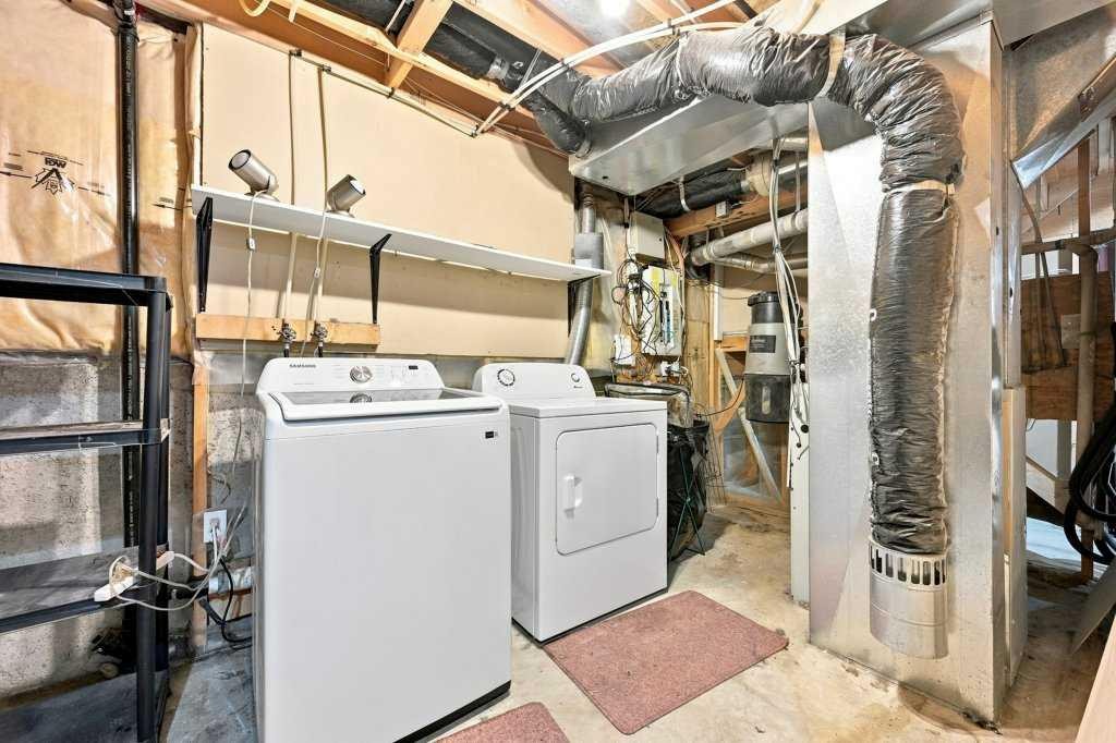 100 Coventry Road Ne, Calgary, AB - Indoor Photo Showing Laundry Room