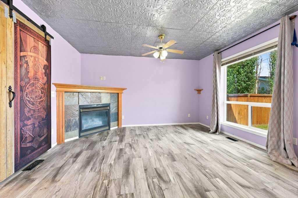 100 Coventry Road Ne, Calgary, AB - With Fireplace