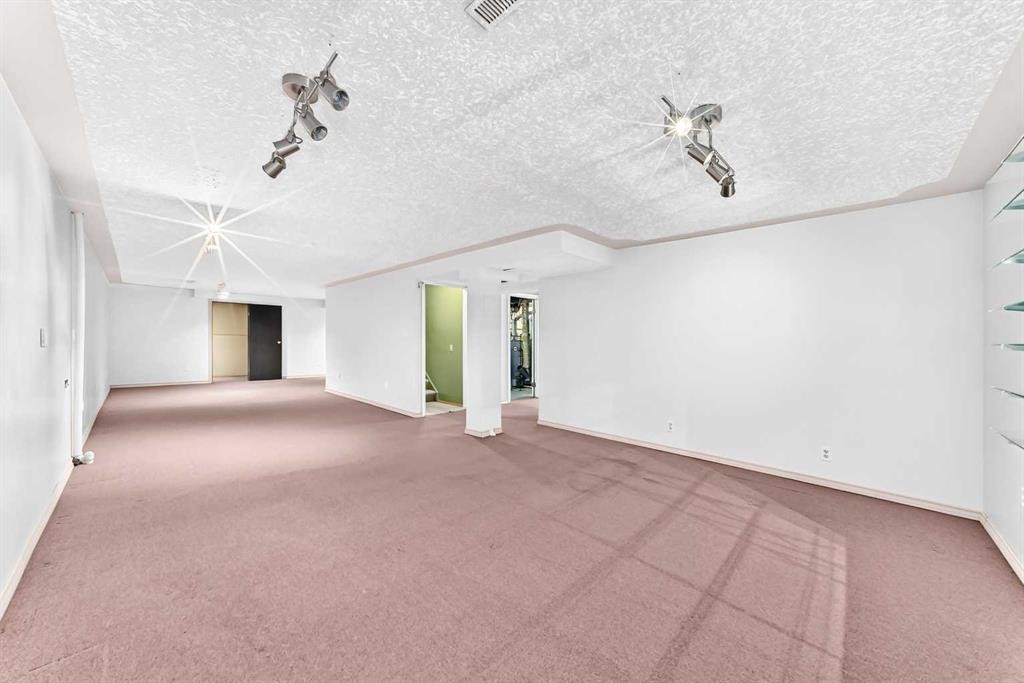 128 Erin Woods Drive Se, Calgary, AB - Indoor Photo Showing Other Room
