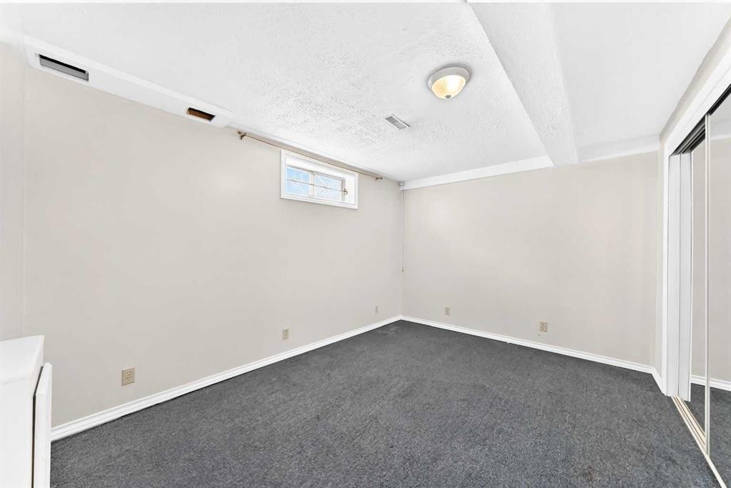128 Erin Woods Drive Se, Calgary, AB - Indoor Photo Showing Other Room