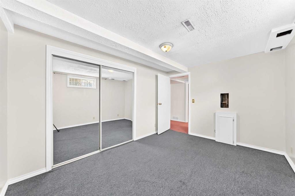 128 Erin Woods Drive Se, Calgary, AB - Indoor Photo Showing Other Room