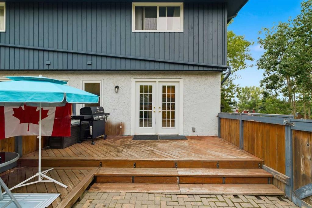 12-800 Bowcroft Place, Cochrane, AB - Outdoor With Exterior