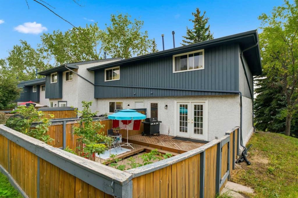 12-800 Bowcroft Place, Cochrane, AB - Outdoor With Exterior