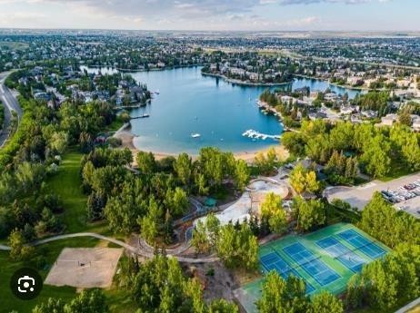 115 Mckenna Crescent Se, Calgary, AB - Outdoor With Body Of Water With View