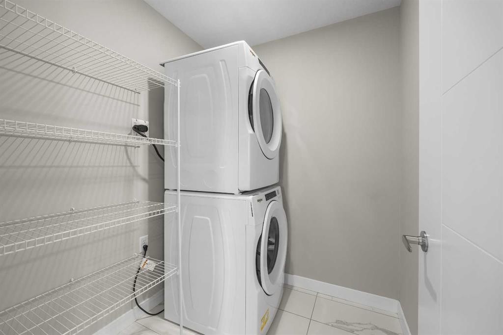 615 Evanston Link Nw, Calgary, AB - Indoor Photo Showing Laundry Room