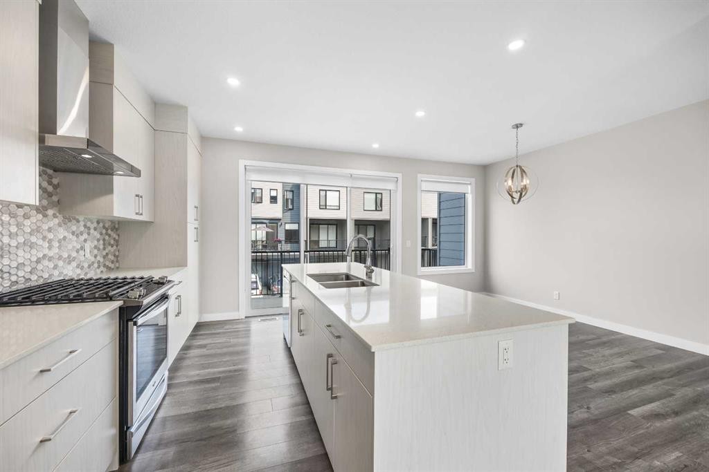 615 Evanston Link Nw, Calgary, AB - Indoor Photo Showing Kitchen With Double Sink With Upgraded Kitchen