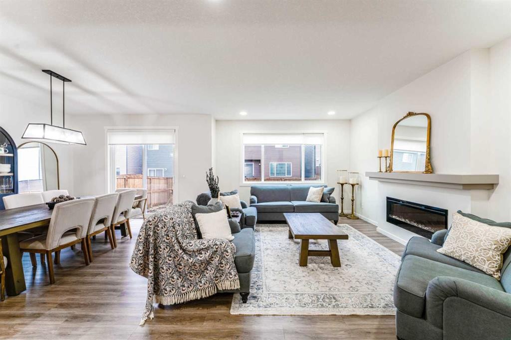 156 Savanna Drive Ne, Calgary, AB - Indoor Photo Showing Living Room With Fireplace