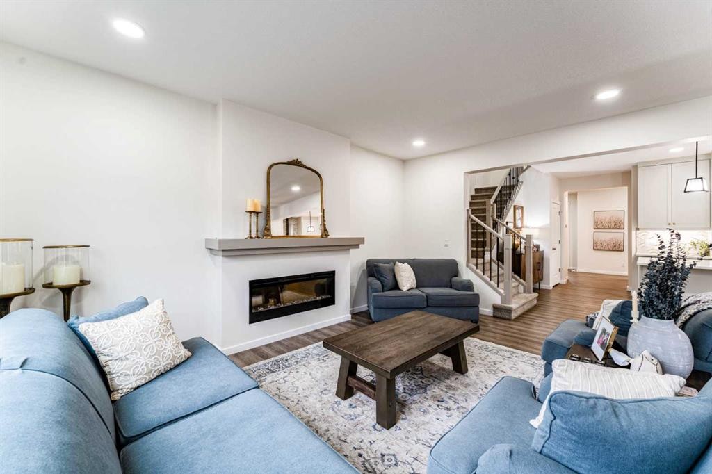156 Savanna Drive Ne, Calgary, AB - Indoor Photo Showing Living Room With Fireplace