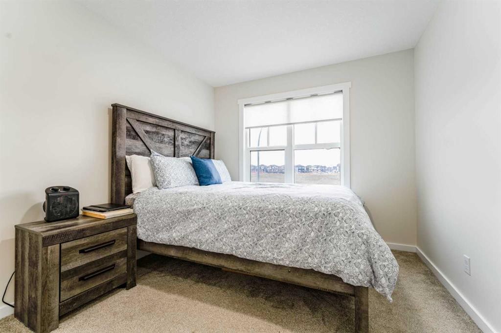 156 Savanna Drive Ne, Calgary, AB - Indoor Photo Showing Bedroom