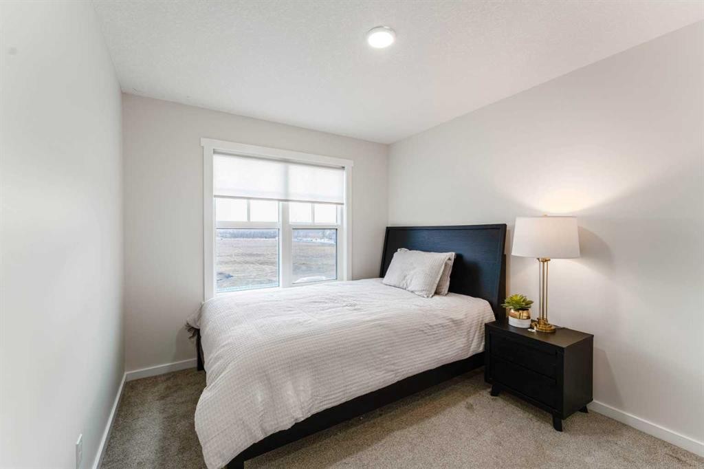156 Savanna Drive Ne, Calgary, AB - Indoor Photo Showing Bedroom