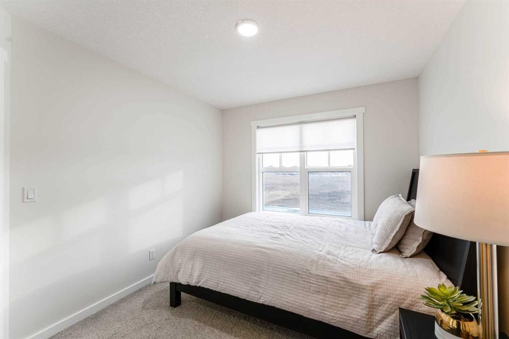 156 Savanna Drive Ne, Calgary, AB - Indoor Photo Showing Bedroom