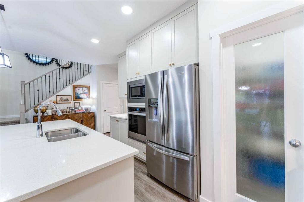 156 Savanna Drive Ne, Calgary, AB - Indoor Photo Showing Kitchen With Double Sink