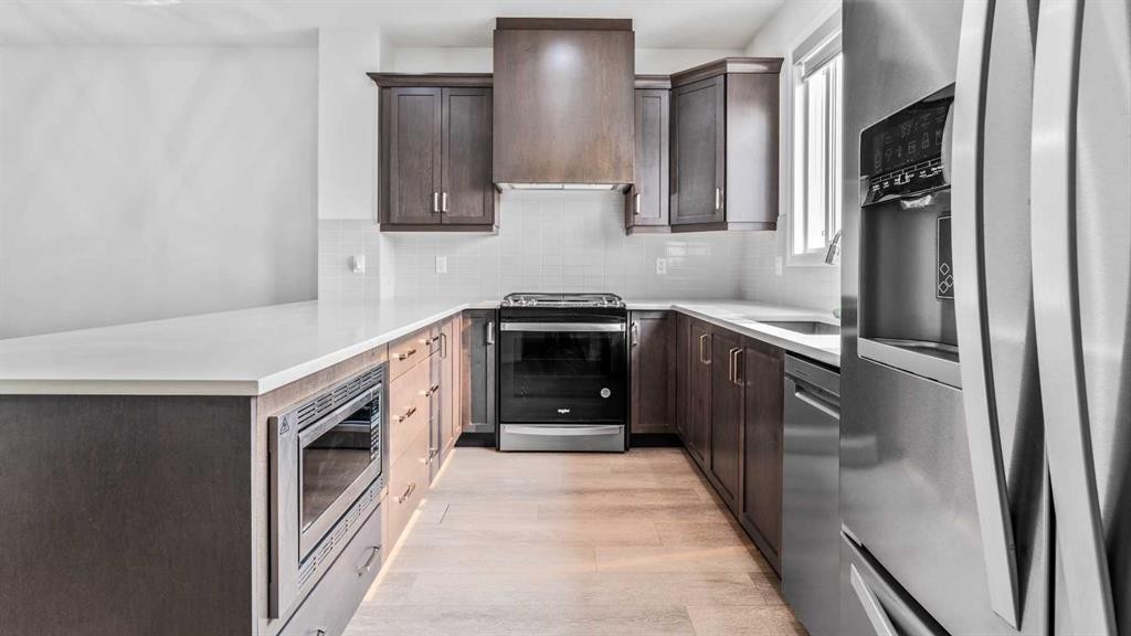 87 Corner Meadows Grove Ne, Calgary, AB - Indoor Photo Showing Kitchen With Upgraded Kitchen