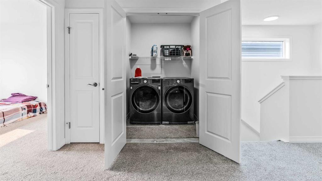 87 Corner Meadows Grove Ne, Calgary, AB - Indoor Photo Showing Laundry Room