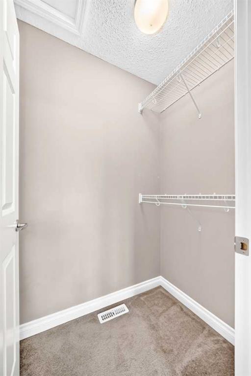129-308 11 Avenue, High River, AB - Indoor With Storage